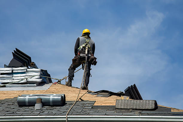 Professional Gutter Installation technician working in Packwood, WA